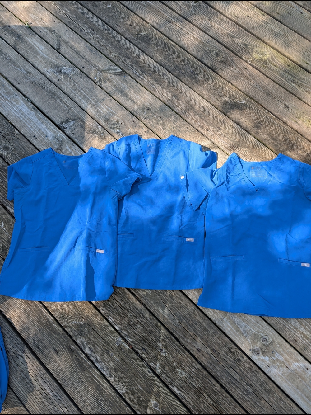 Figs Royal Blue Casma™ - Three-Pocket Scrub Top
S - Royal Blue